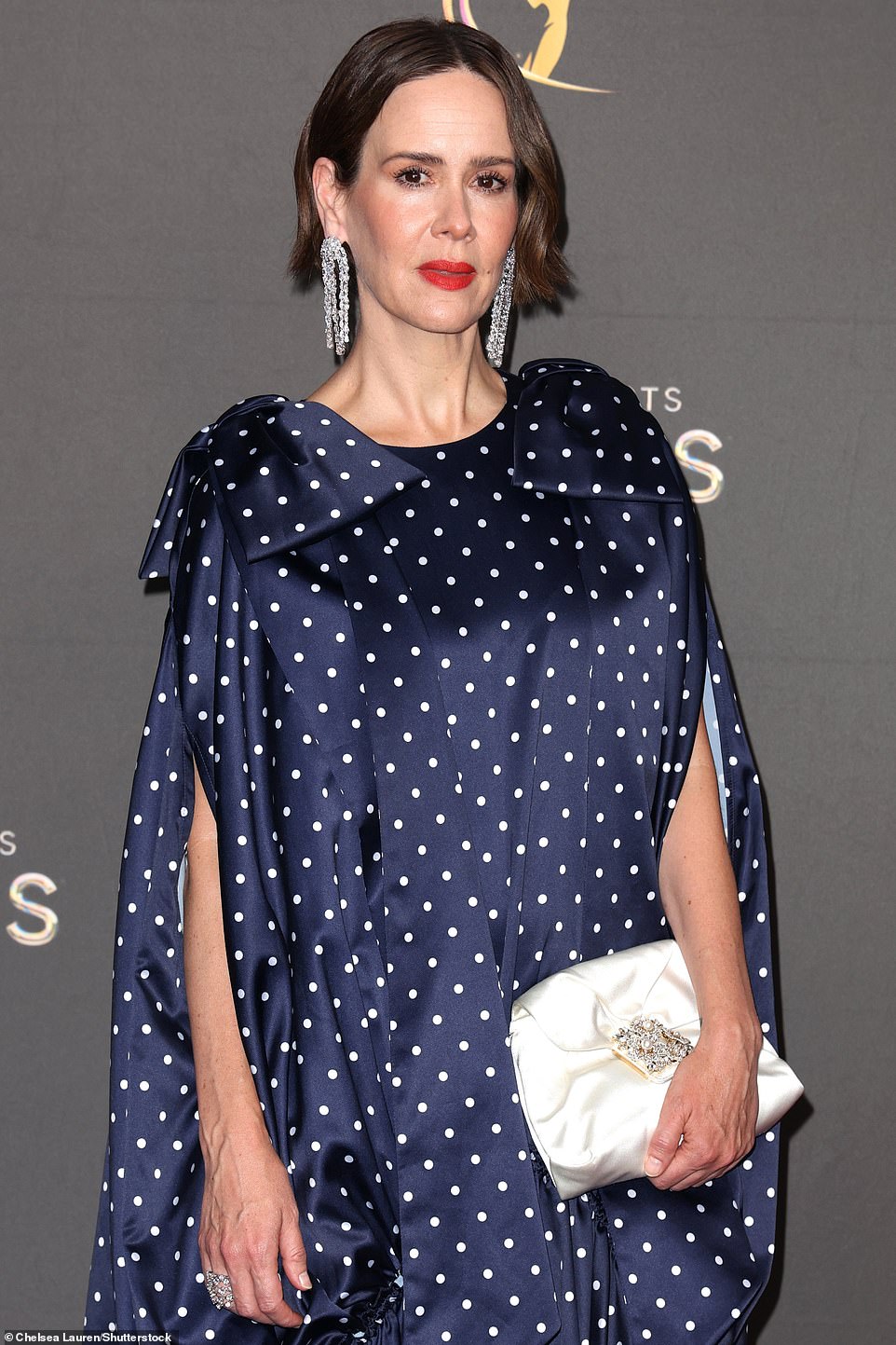 American Horror Story alum Sarah, 49, exuded sophisticated elegance in a navy blue dress embellished with white polka dots.