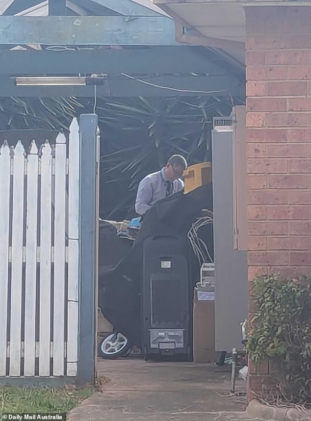 Forensic police were seen sifting through debris outside the home after joining fire investigators and the Victoria Police Arson Squad at the scene.