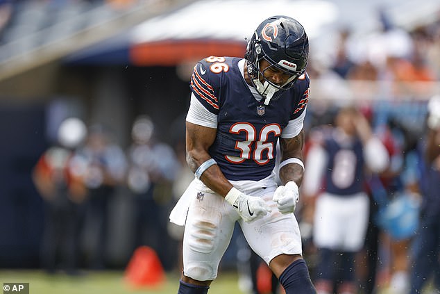 Owens celebrates after scoring during the third quarter of the Bears' season opener on Sunday