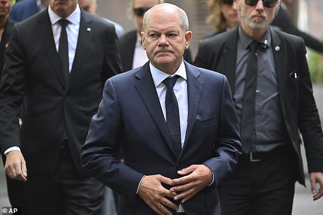 German Chancellor Olaf Scholz visits the scene of the August 26 knife attack