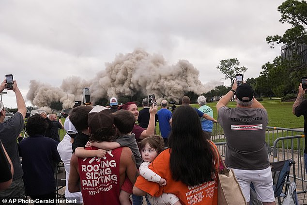 Tuff Gary, left, and Morgan LeBlanc watched the implosion of the Hertz Tower with their sons Hudson, Tuff, Jr. and Zander on Saturday, Sept. 7, 2024.