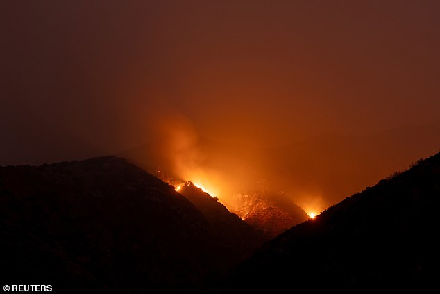 The Line Fire continues to burn in the mountains of the San Bernardino National Forest above Highland, California