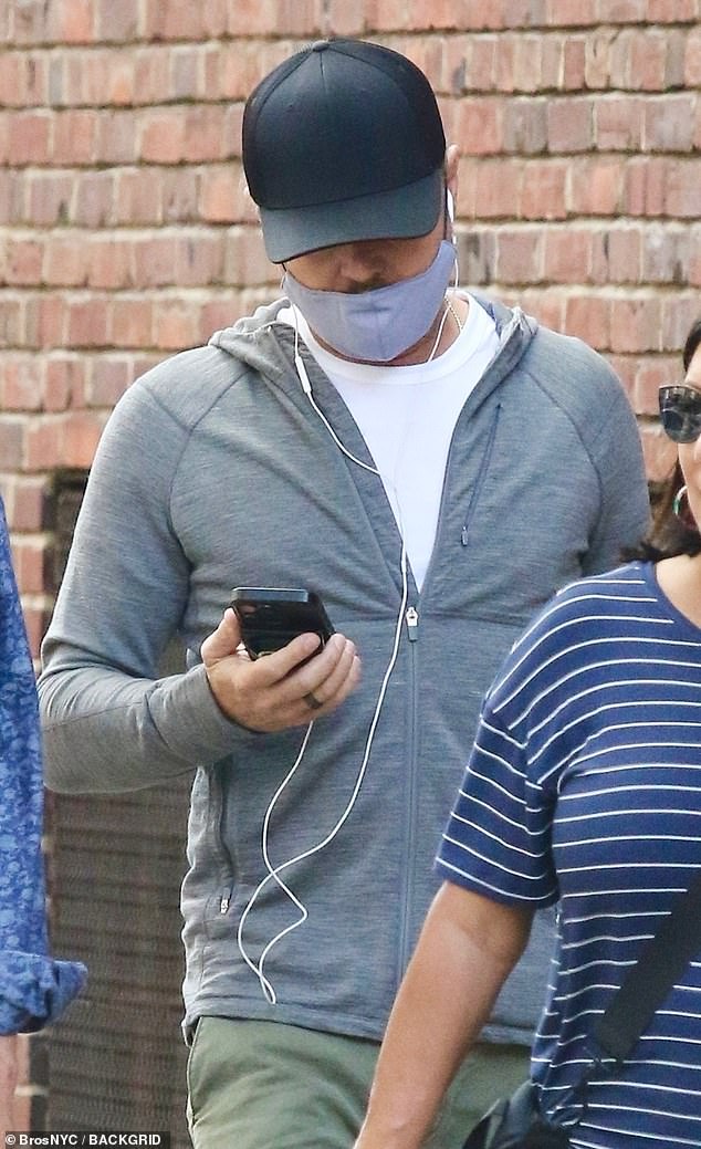 The couple appeared to have done some shopping, as the Italian beauty was carrying a white shopping bag.