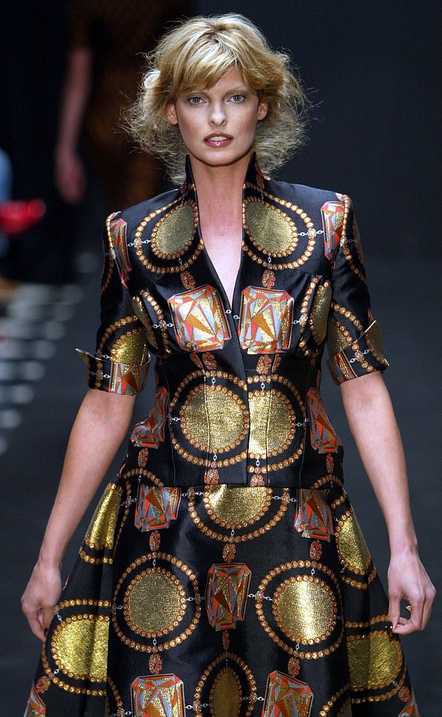 Linda walking the London Fashion Week catwalk for Giles Deacon modelling a blonde look