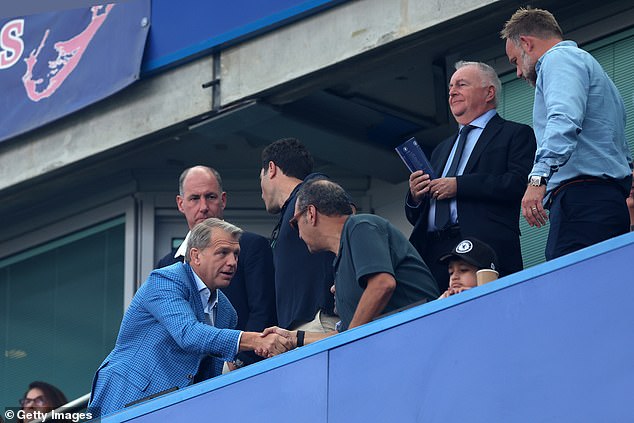 Boehly (left) regularly attends Chelsea games at Stamford Bridge to keep a close eye on the action.