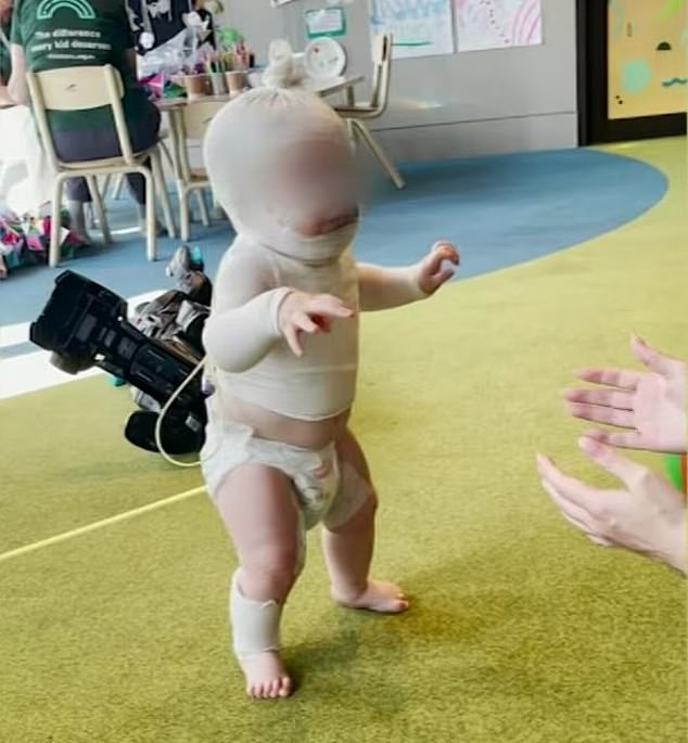 Nine-month-old baby Luka (pictured) was enjoying a picnic with his mother and friends at Hanlon Park in Brisbane's south when he was attacked by the stranger.