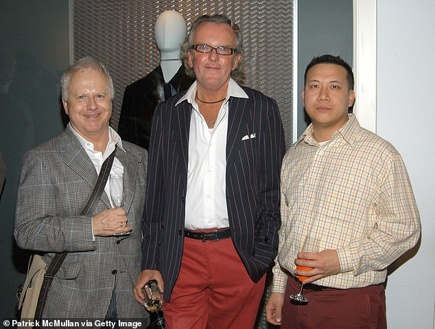 Victim Kenneth Savinski (center) is shown with two friends in 2006. He moved his antiques store from Maryland to New York in 2000 and received a favorable mention in the New York Times.