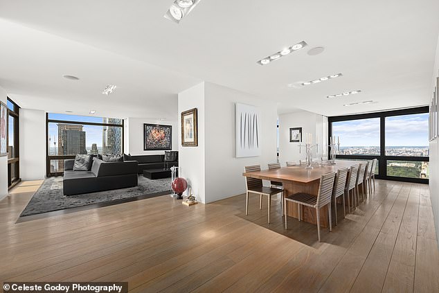 Wide-plank hardwood floors run throughout the 3,500 square foot apartment.