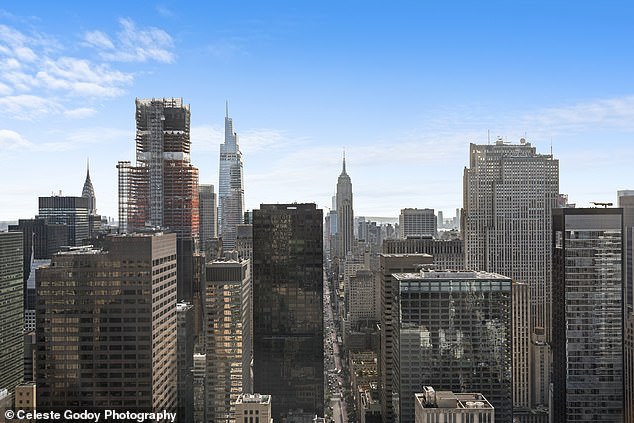 Looking south along Fifth Avenue, the concrete jungle of New York City comes into clear view.