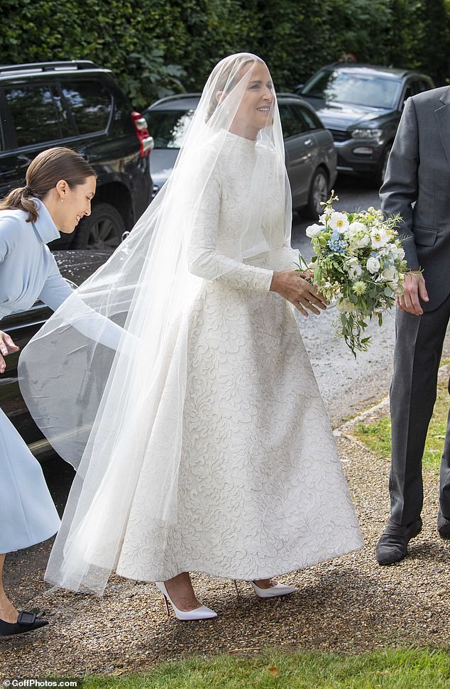 The granddaughter of Earl Mountbatten wore a high-necked wedding dress with ivory tulle and lace and an A-line skirt for the big day.