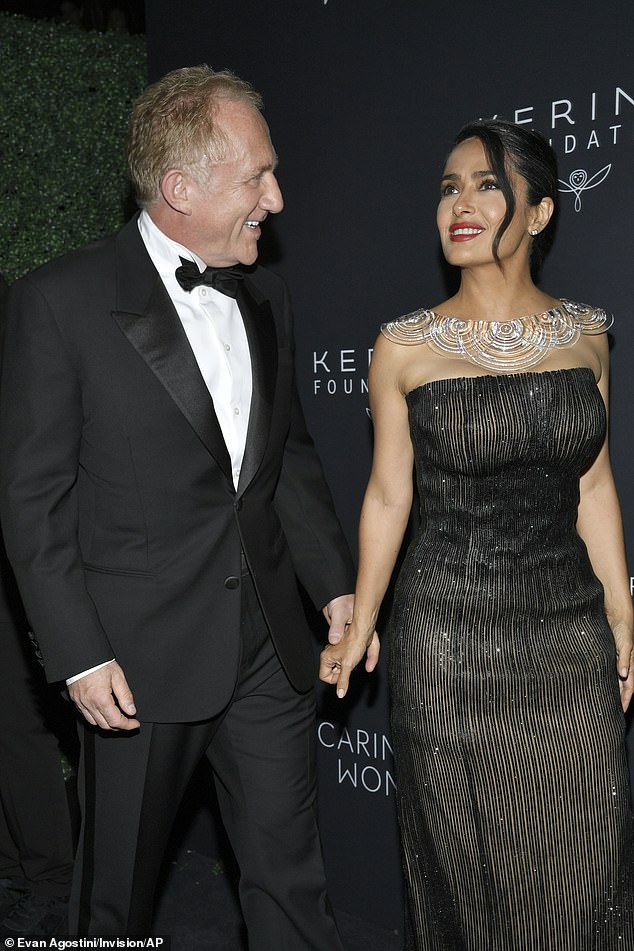 Salma and François-Henri looked more than in love as they arrived at the event holding hands.