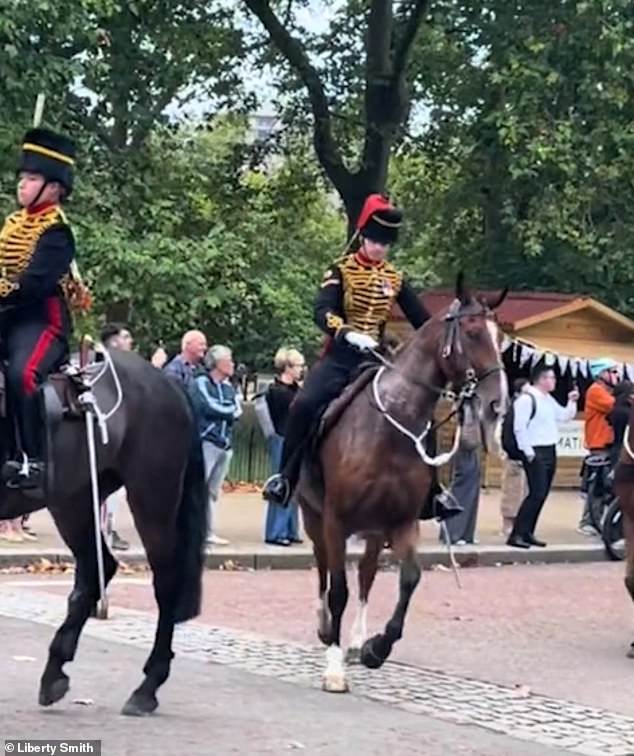 The mounted soldier remained calm as he attempted to regain control of the frightened horse and get it back in line.