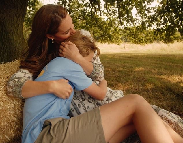 Catalina kisses her eldest daughter's head in a tender hug.