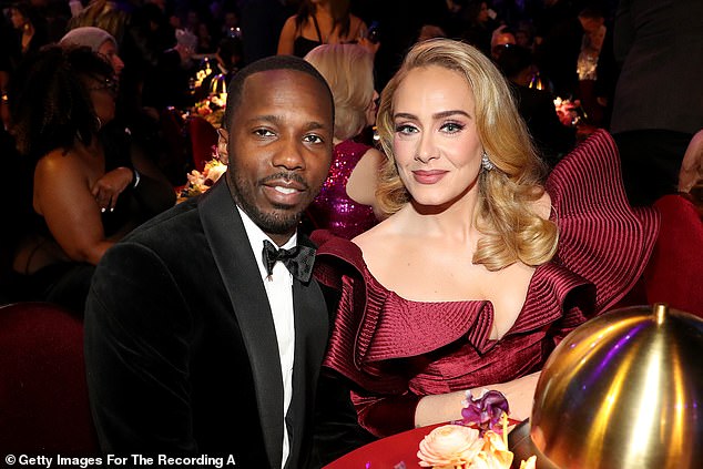 She is known to be planning to move to the UK, where she has a luxury apartment in central London, later this year (Adele pictured with her Rich Paul in Los Angeles)