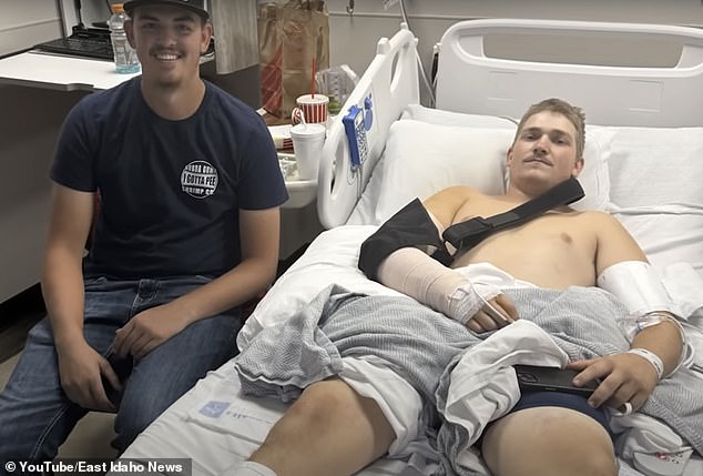 Riley Hill, 20, (right), was flown to Eastern Idaho Regional Medical Hospital, where he received 40 staples and numerous stitches. He was released from the hospital, but doctors estimate it will be at least two months before his arm heals. He is pictured with Braxton Meyers, (left), who was with him during the attack.