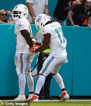 The receiver celebrates