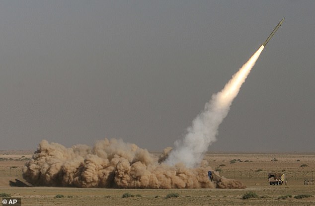 Pictured here is a Fateh missile being launched by Iran's Revolutionary Guard Corps.