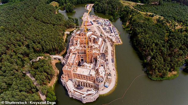 Although the castle itself is still under construction, visitors are welcome to explore the surrounding area. This photograph was taken several years ago.