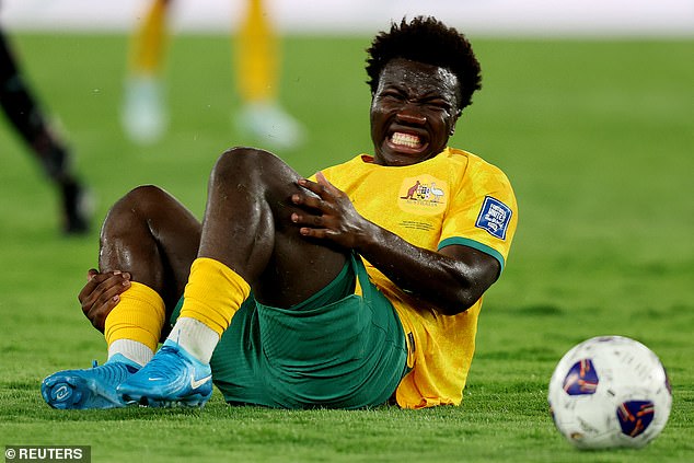 However, despite dominating possession and creating several chances, the Socceroos failed to score for the second game in a row. Australia's Nestory Irankunda reacts after suffering an injury