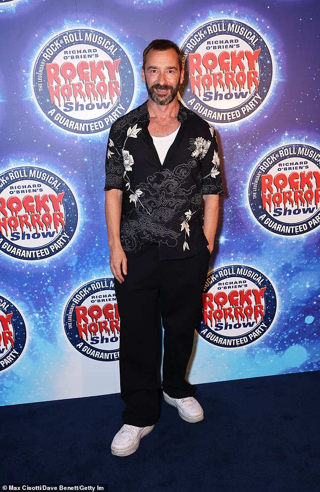 Coronation Street star Charlie Condou kept things casual in a pair of dark trousers, trainers and a floral shirt.