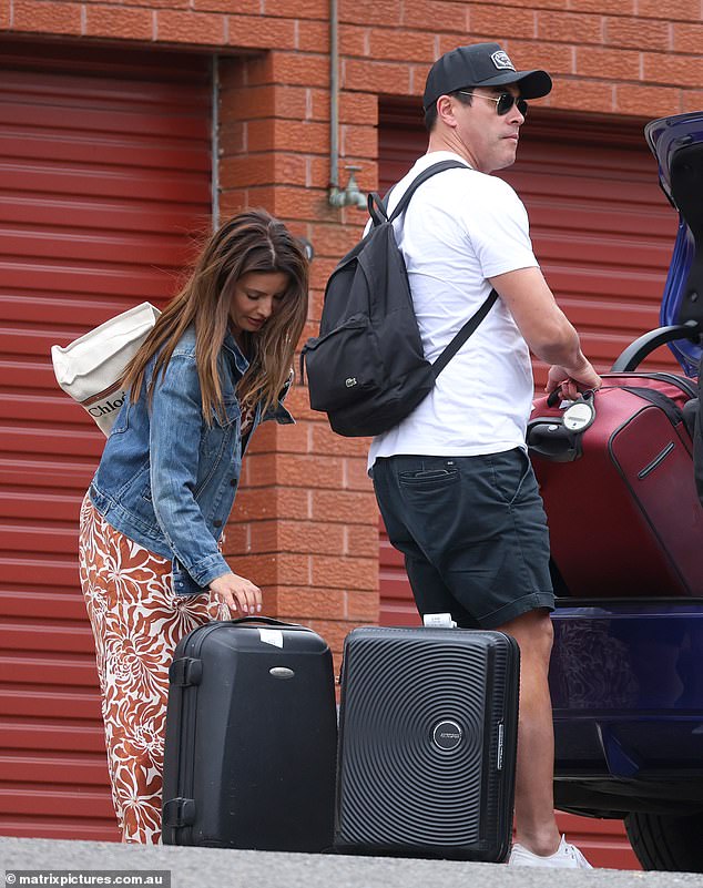 The couple dressed casually after returning from their relaxing getaway.