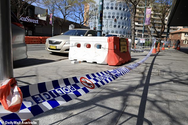 Police tape was still hanging on the sidewalk on Macquarie Street on Monday.