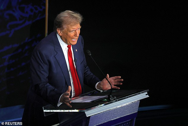 Republican presidential candidate and former US President Donald Trump gestures as he speaks during a presidential debate with Democratic presidential candidate and US Vice President Kamala Harris