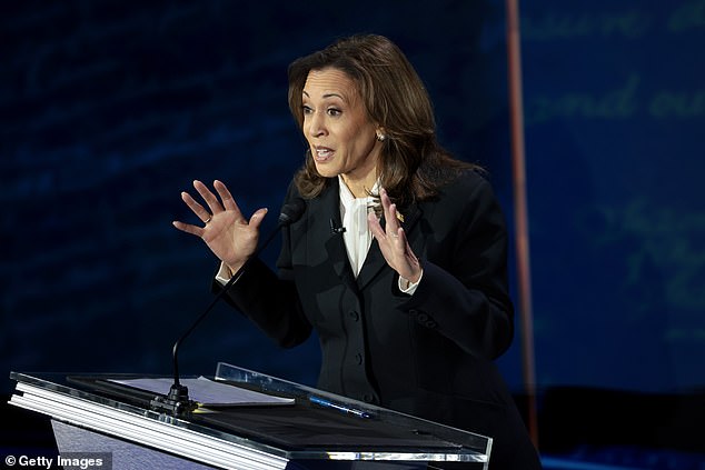 Democratic presidential candidate and US Vice President Kamala Harris debates Republican presidential candidate and former US President Donald Trump