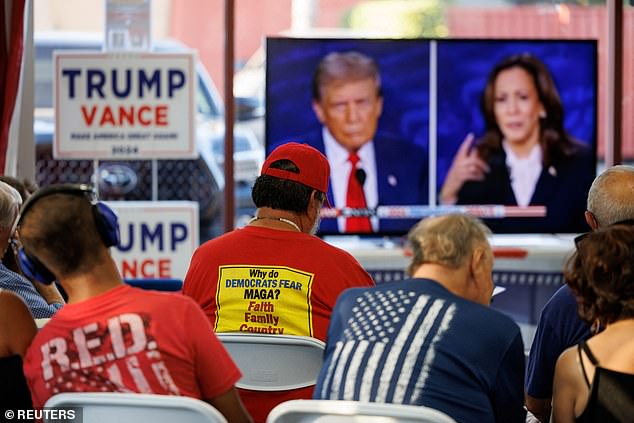 Members of the Escondido Republican Women watch from their headquarters the presidential debate between Democratic presidential candidate, U.S. Vice President Kamala Harris, and Republican candidate and former U.S. President Donald Trump, in Escondido, California.