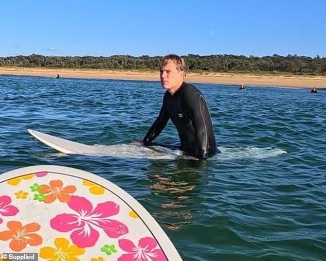 The student (pictured) said he thought the gate was going to fall into the waves, but as it got closer, he and the other surfers thought it was going to fall on a fisherman.