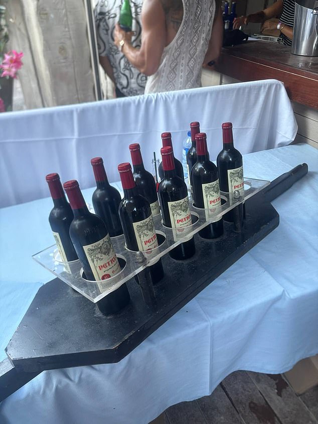 The executive and his friends bought 10 bottles of Petrus (pictured)