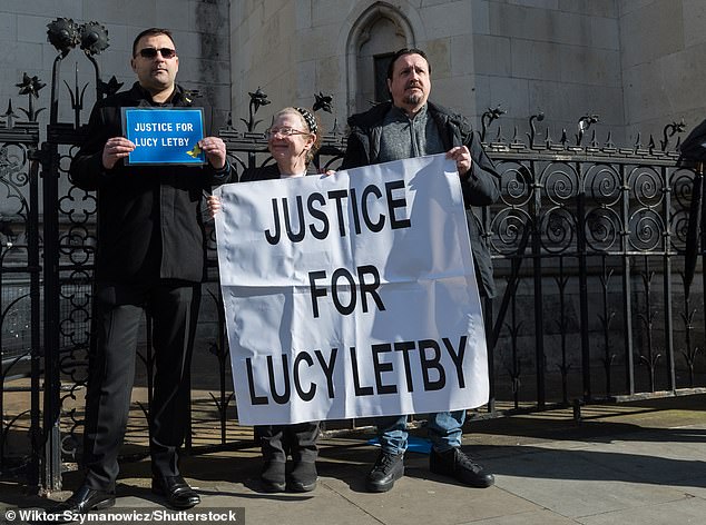 Letby's supporters, who believe he is innocent of murdering seven babies and the attempted murder of seven more, outside the Court of Appeal.