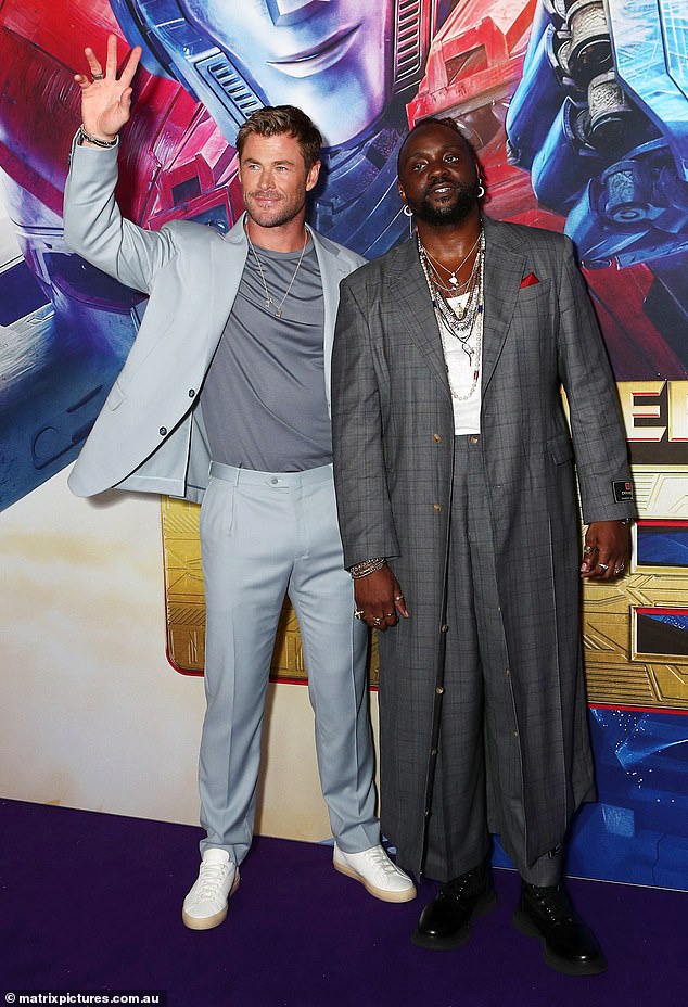 Chris was later all smiles as he posed for photos with his co-stars ahead of the first Australian screening of the highly anticipated animated action film. He is pictured with Brian Tyree Henry