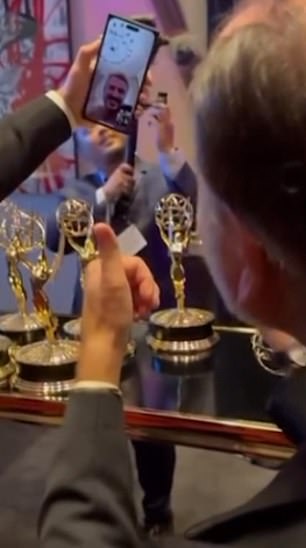 In a clip shared on Instagram from the Emmys, a group gathered around Fisher as he video-called David to tell him about the win.