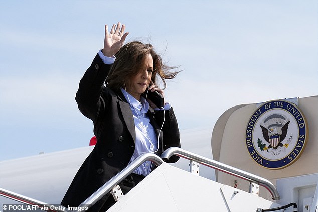 Last week, Harris came under fire for wearing headphones as a throng of reporters tried to question her as she boarded her flight out of Joint Base Andrews in Maryland to campaign in the Midwest (pictured).