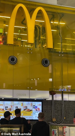 After being cooked by professionals, the food is assembled and placed on a winding conveyor belt that takes it to the waiting area.