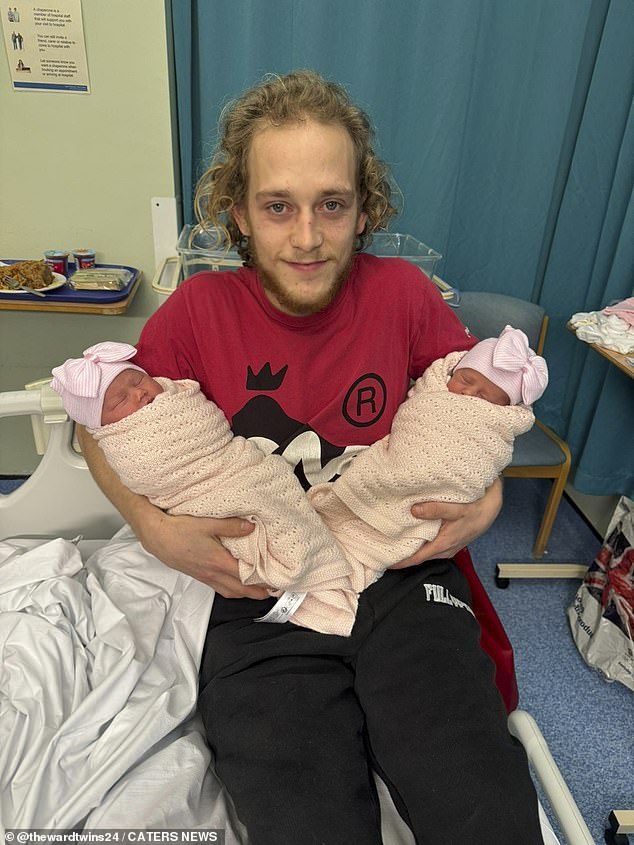 Pictured: Saffron and Azayla with their father Lewey in hospital shortly after birth.