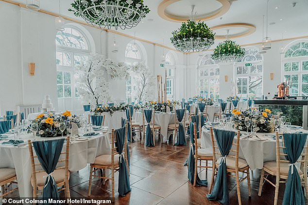 Photos from inside Court Colman Manor House in South Wales, where tables were beautifully decorated and extravagant floral arrangements were made.