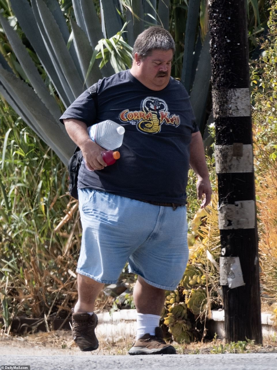 Jess was reportedly left homeless and penniless after the trust fund he inherited from his mother ran out in 2011. He is seen walking home in the midst of the Southern California heat wave last week with a gallon of water and Gatorade in hand.