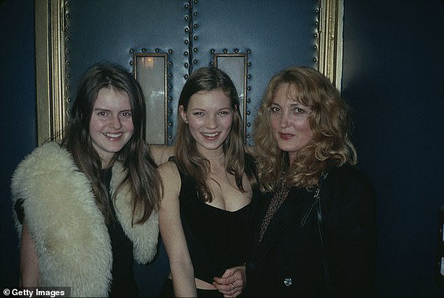 Pictured: Kate Moss (centre) with her mother, Linda Moss (right), and fashion photographer Corinne Day in October 1991.