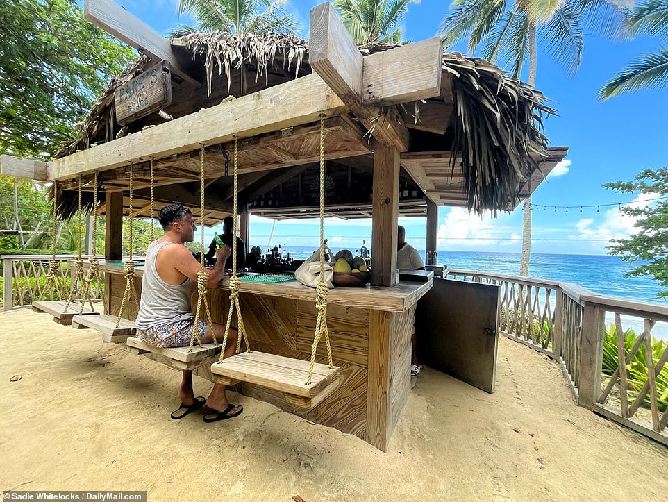 The Casamigos Beach Bar, equipped with swings as bar seating, is one of many on the property.