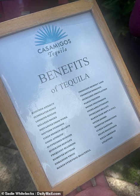 One of the signs on the golf course lists the benefits of drinking tequila, and one of them says 