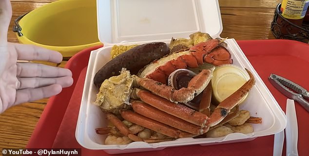 One of the first restaurants you decide to stop at is called Tejun, and some of their specialties include snow crab, lobster, and sausages.