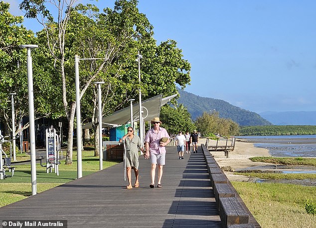 The 51-year-old Australian Olympic gold medallist went for a stroll along the coast with an unidentifiable man in what appeared to be a romantic getaway for the couple.