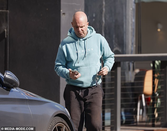 The 49-year-old kept a low profile as he stepped out in a hoodie and black sweatpants.