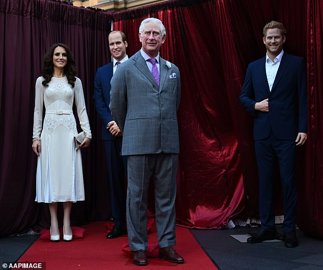 The Prince and Princess of Wales stand next to King Charles as Prince Harry smiles in the corner. A set of royal wax figures unveiled at Madame Tussauds in Sydney