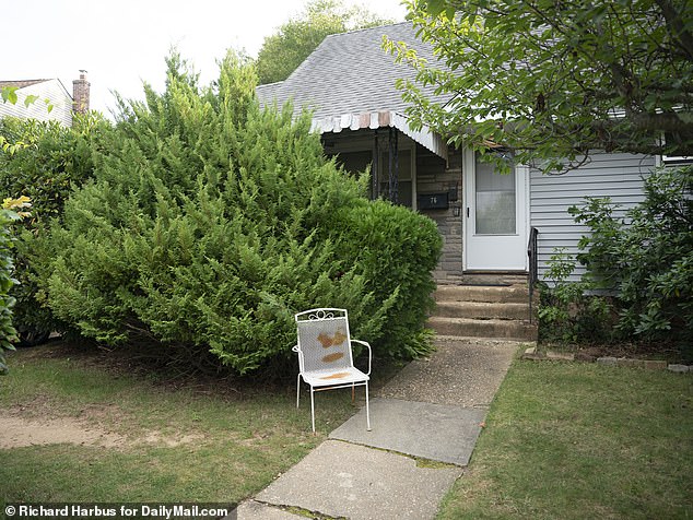 Officers found Joseph DeLucia with a self-inflicted gunshot wound in the front yard of this Syosset, New York, home. The other four victims were found inside