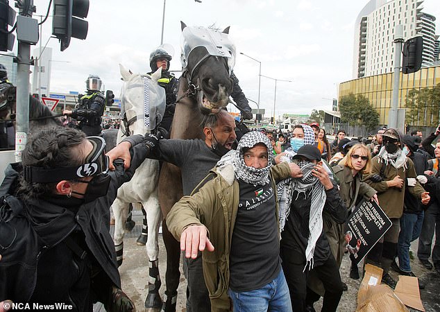 Two dozen officers required medical treatment, while 33 protesters were arrested for various offences, including arson and assaulting police.