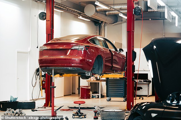 Drivers are entitled to an equivalent replacement vehicle if they are involved in an accident that is not their fault. However, this does not require after-care companies or insurers to provide a vehicle with the same powertrain (pictured, a Tesla being repaired).