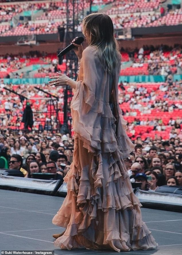 The English singer-songwriter and model shared a series of behind-the-scenes snaps from the concert and said her 